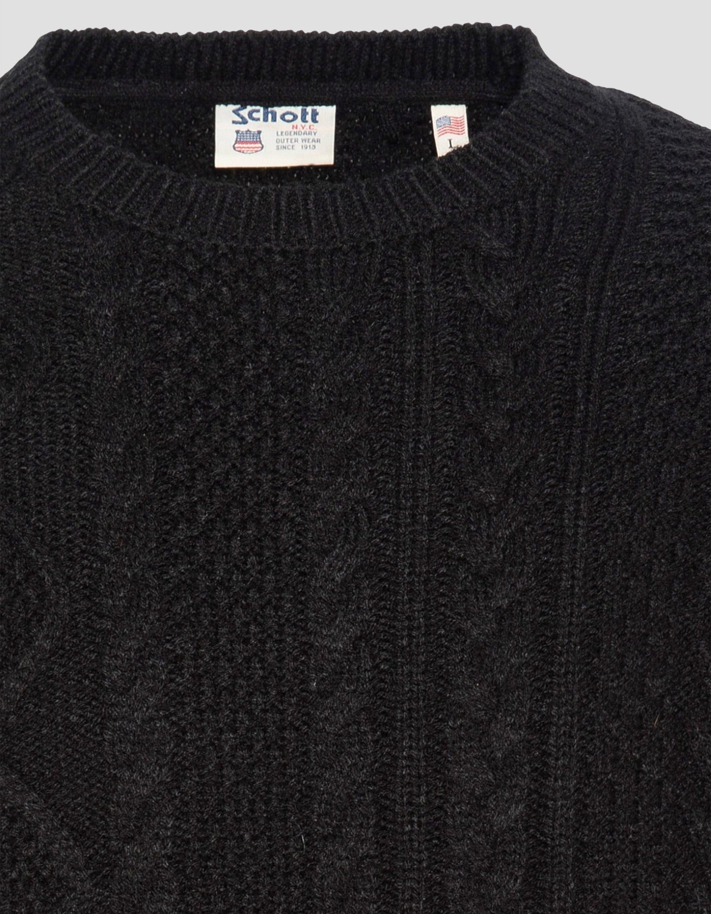 Pull col rond à mailles torsadées