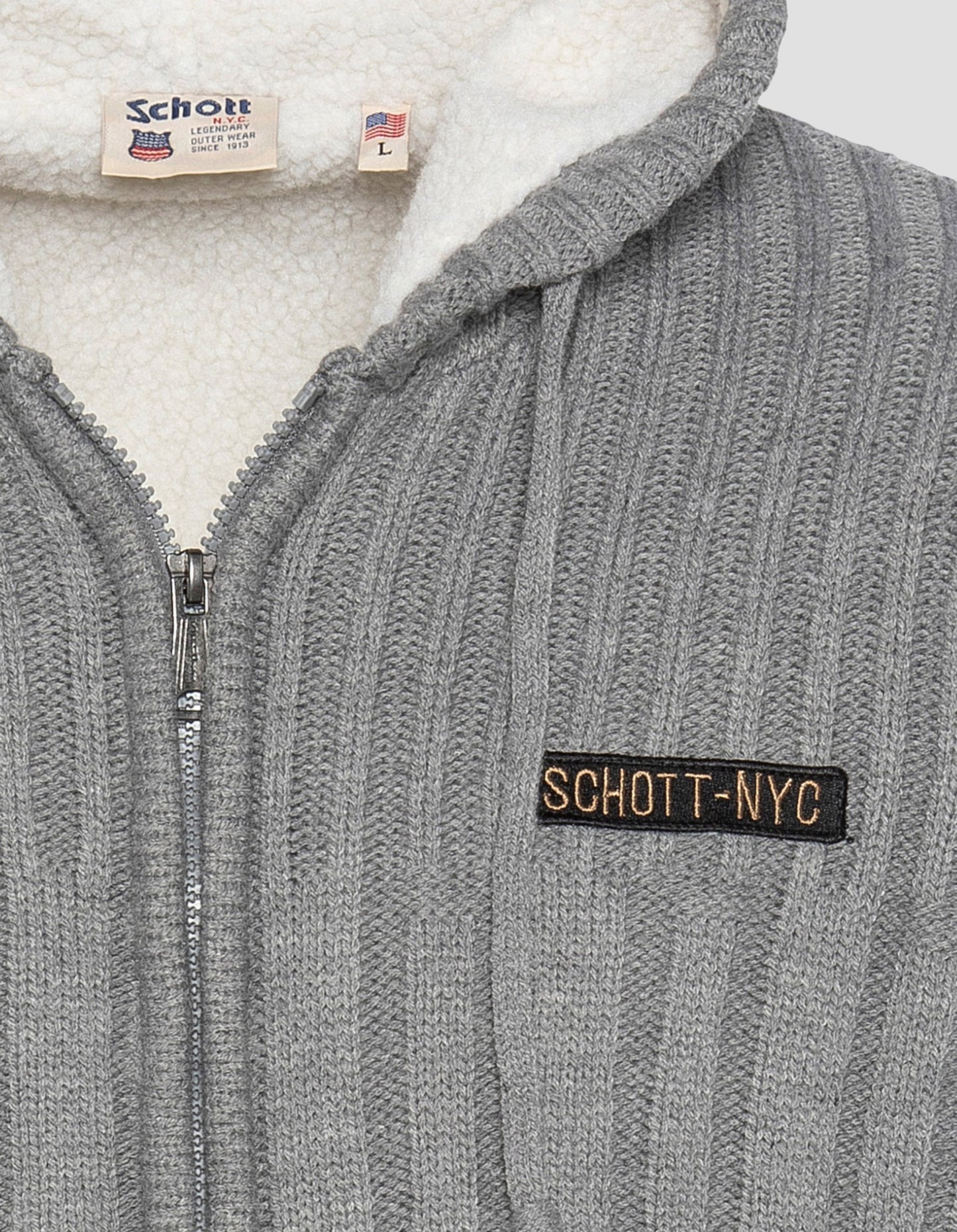 Gilet à capuche doublé sherpa