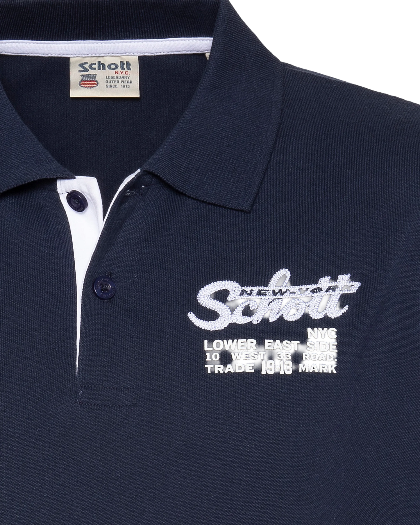 Polo bleu marine avec logo brodé et patte contrastée