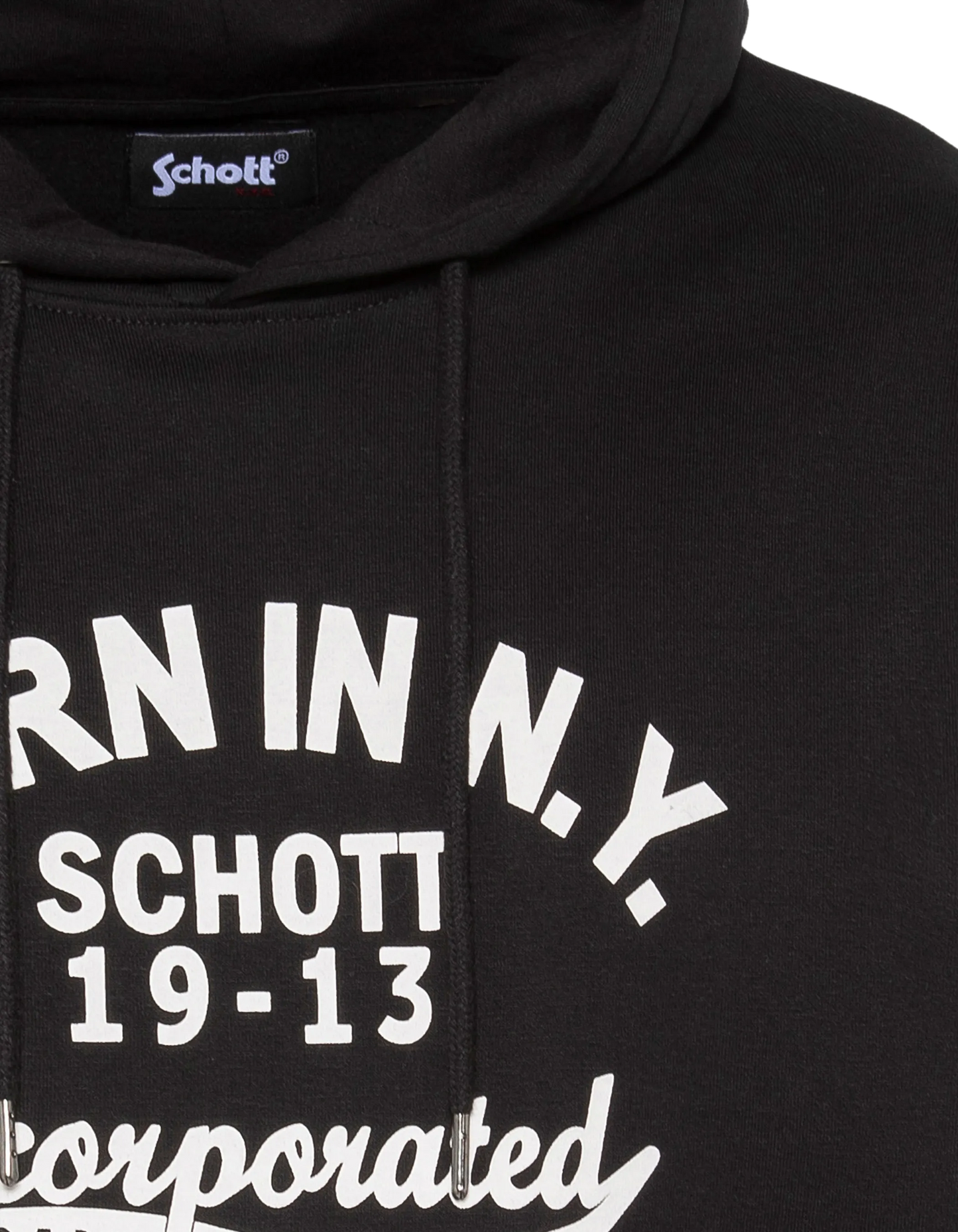 Black hooded sweatshirt printed “BORN IN N.Y.”