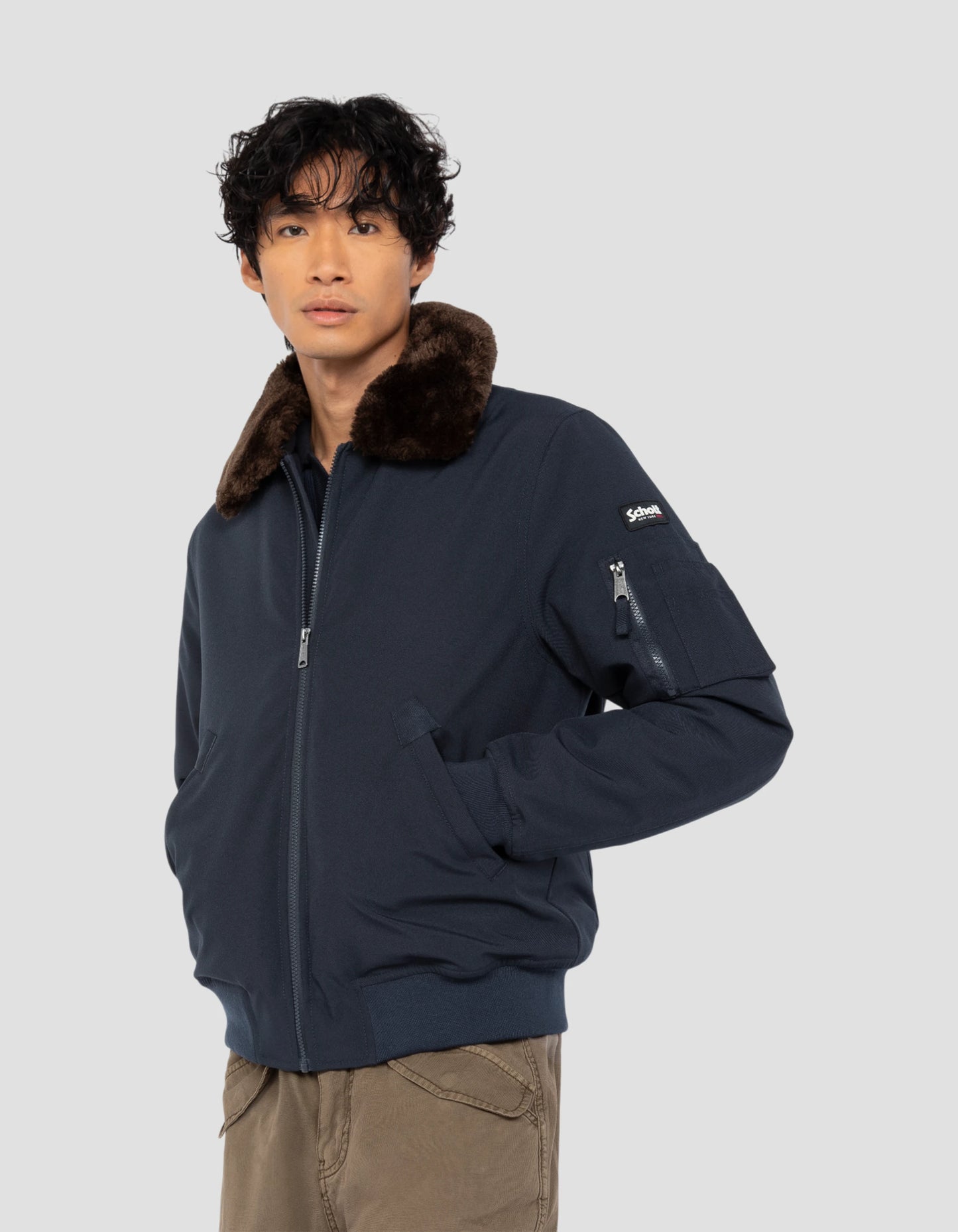 Blouson pilote bleu marine et marron
