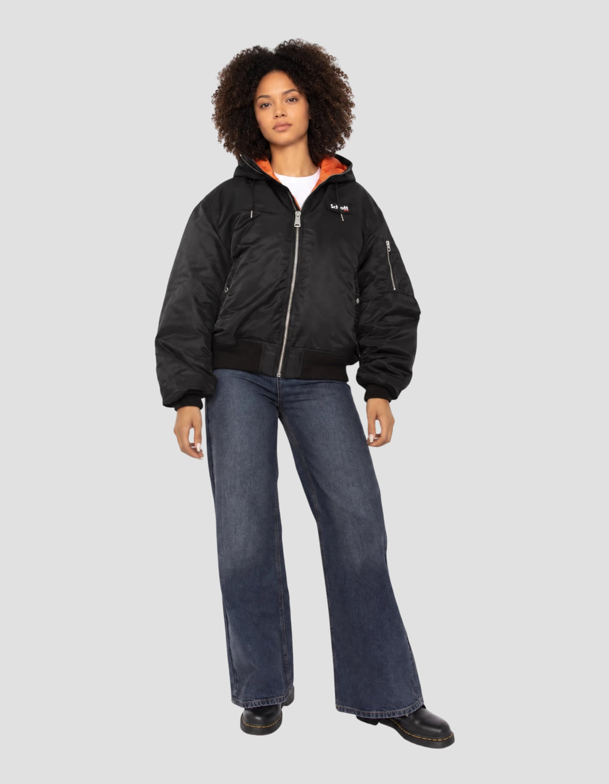 Blouson bomber noir type N2B à capuche avec sac à dos intégré