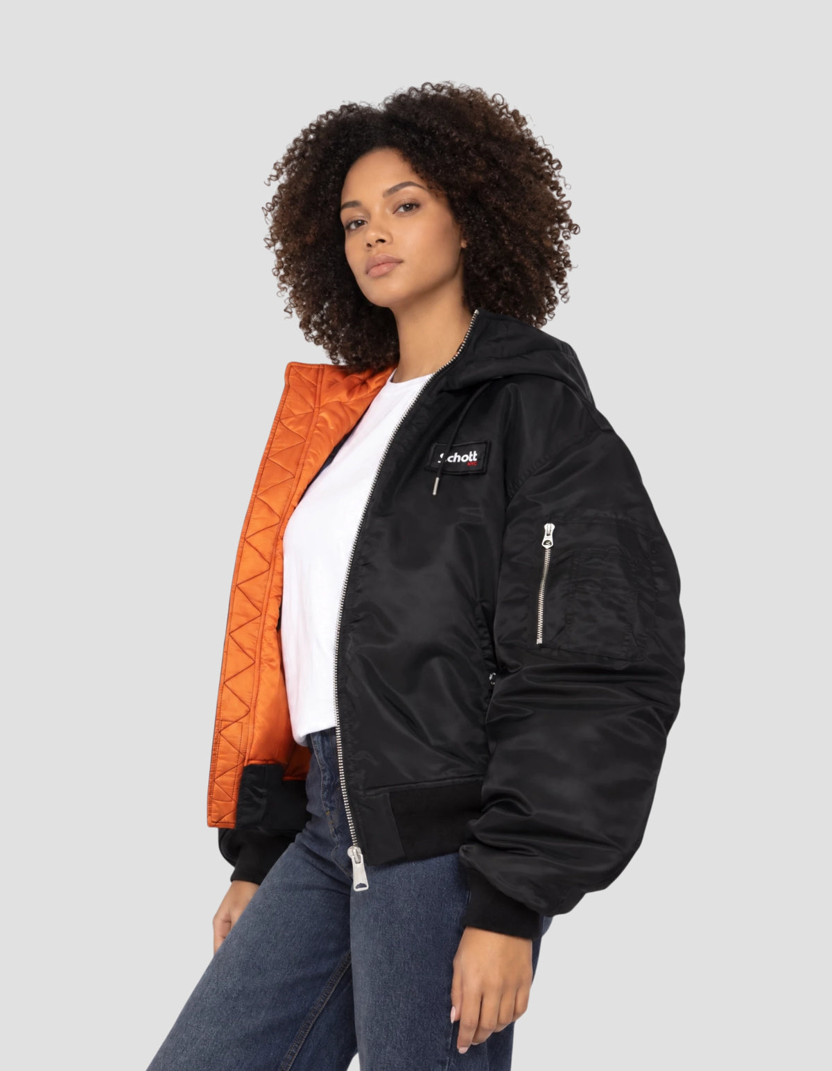 Blouson bomber noir type N2B à capuche avec sac à dos intégré
