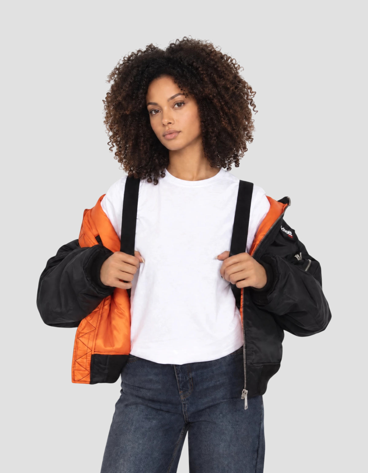 Blouson bomber noir type N2B à capuche avec sac à dos intégré