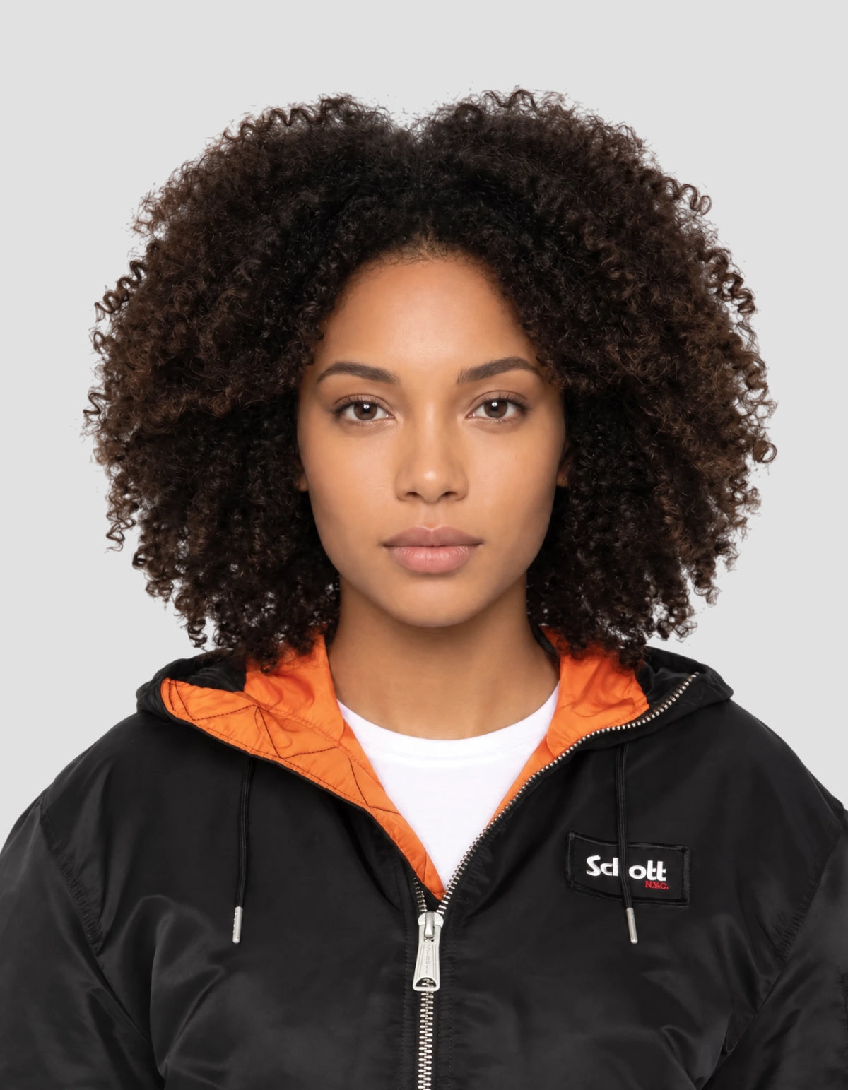 Blouson bomber noir type N2B à capuche avec sac à dos intégré