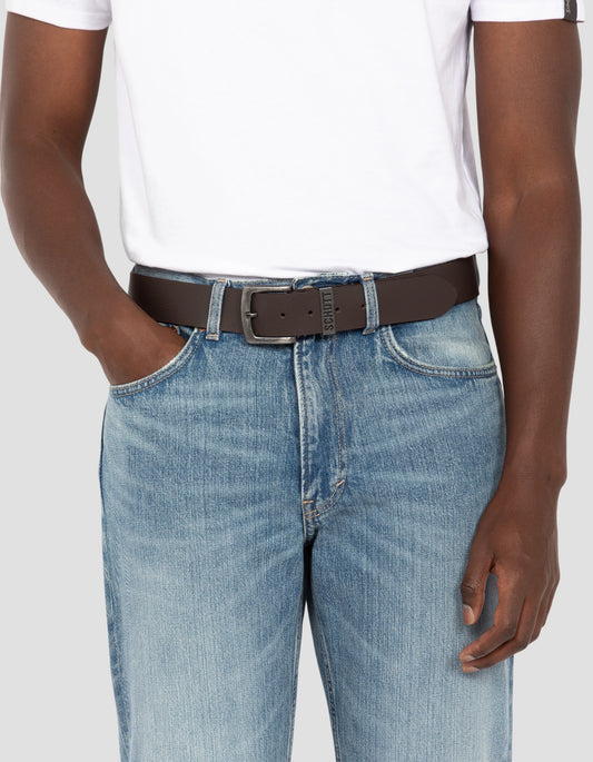 Vintage brown belt with perforated metal buckle, cowhide leather