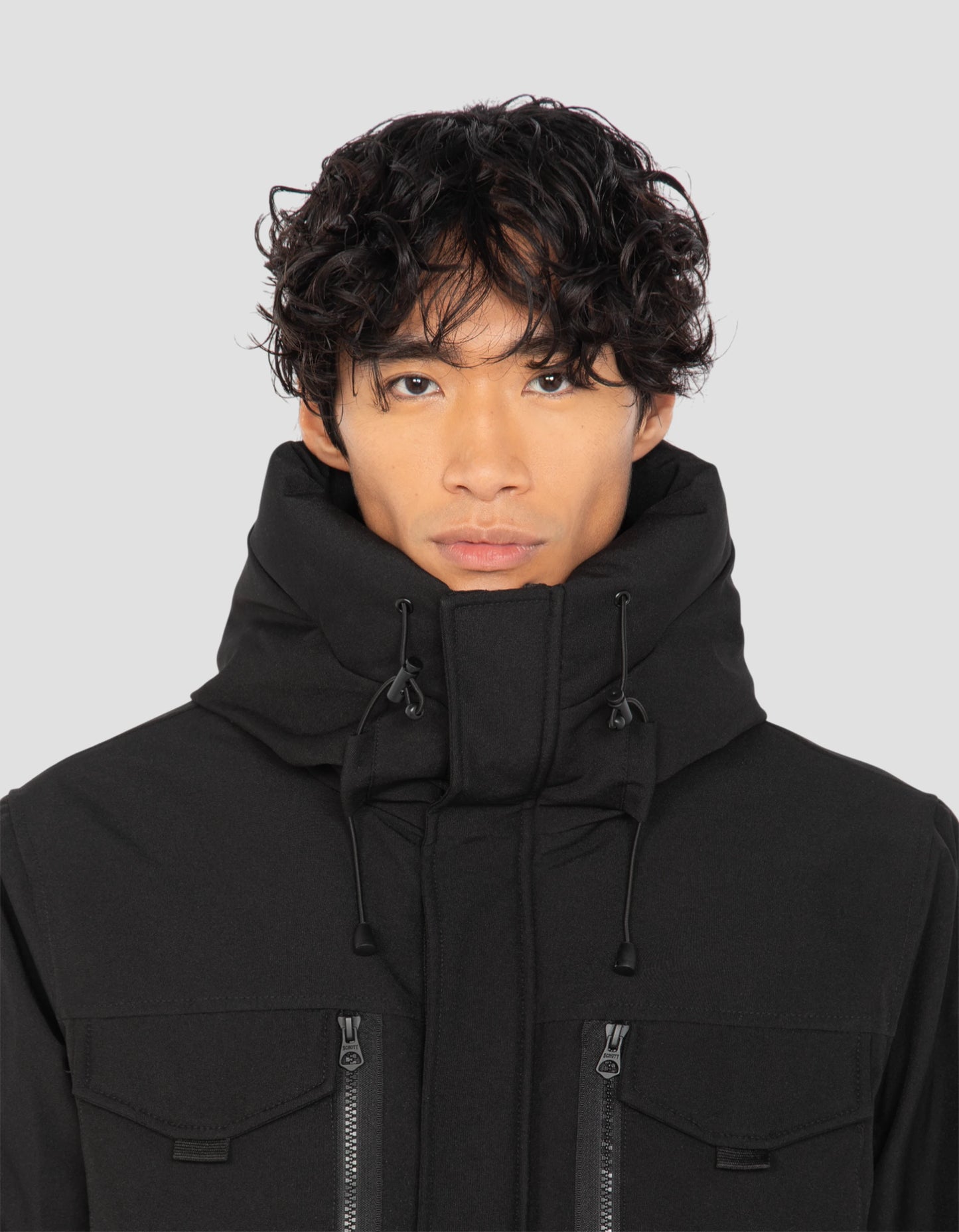 Multipoche nere con cappuccio