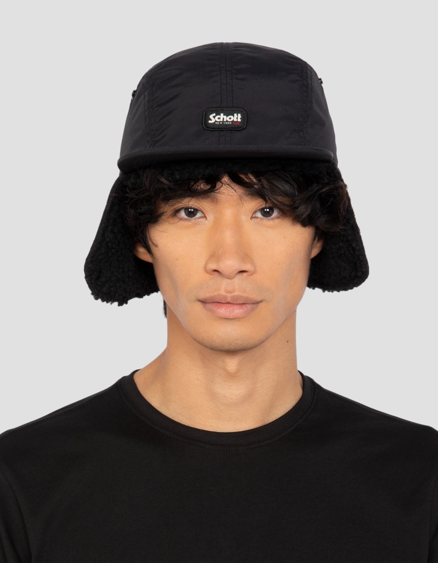 Tapa de chapka negra forrada de Sherpa