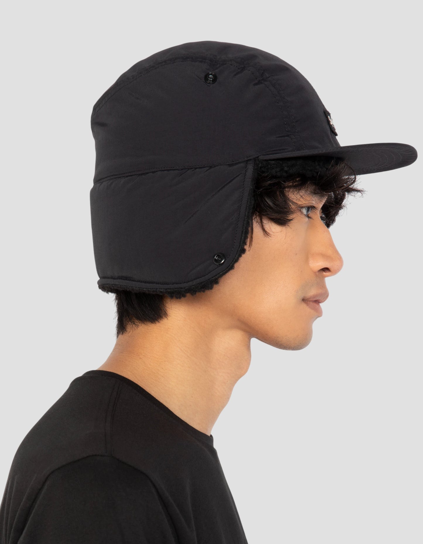 Tapa de chapka negra forrada de Sherpa