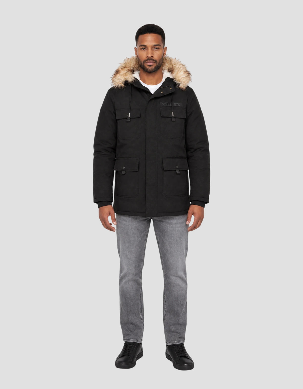 Parka à capuche noire avec fausse fourrure amovible