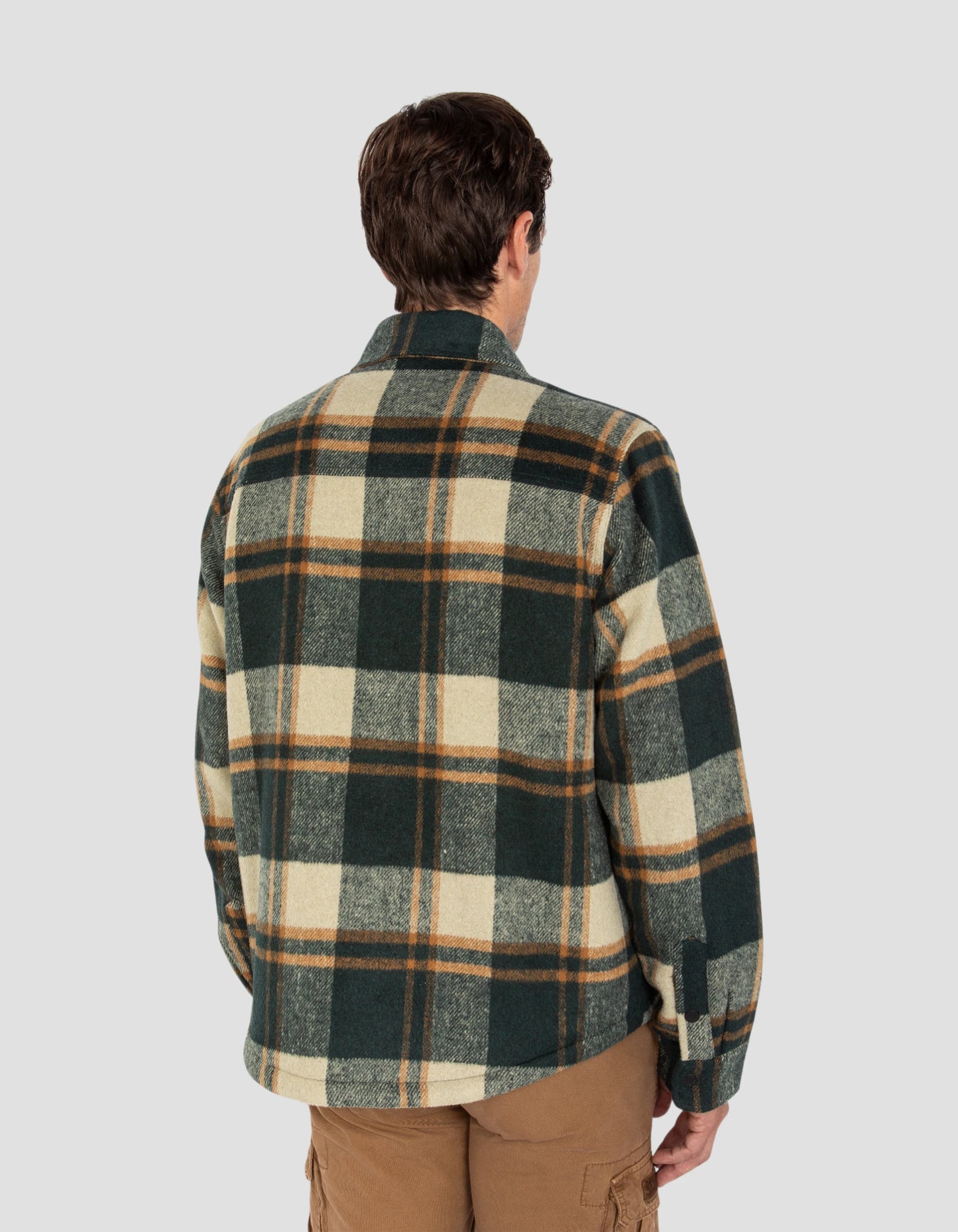 Giacca quadrata verde fiancheggiata da sherpa