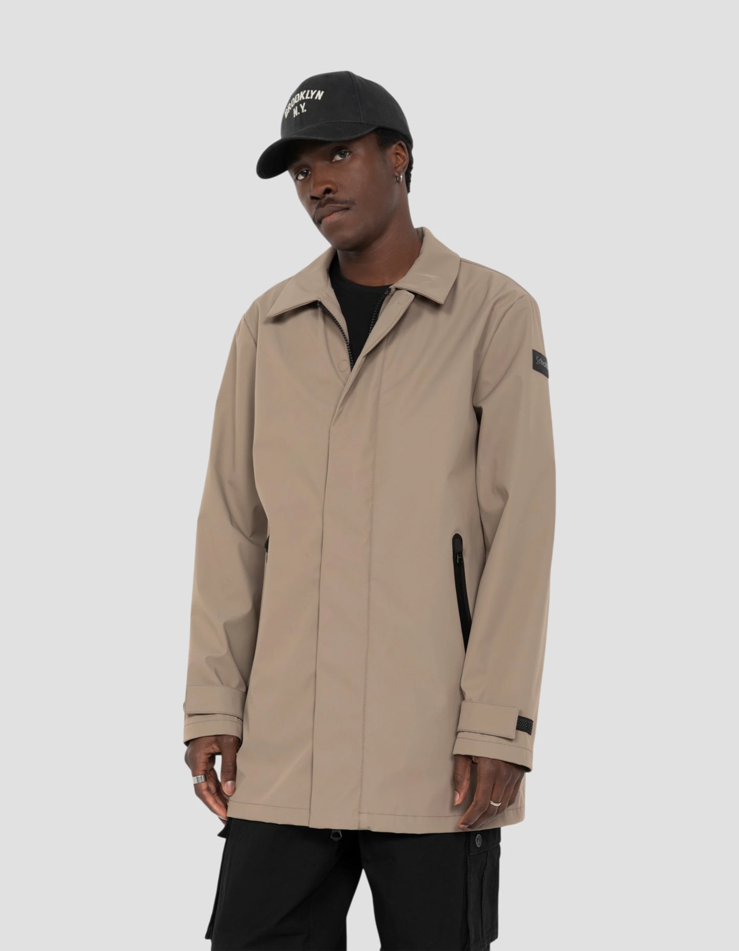 Beige water-repellent technical coat