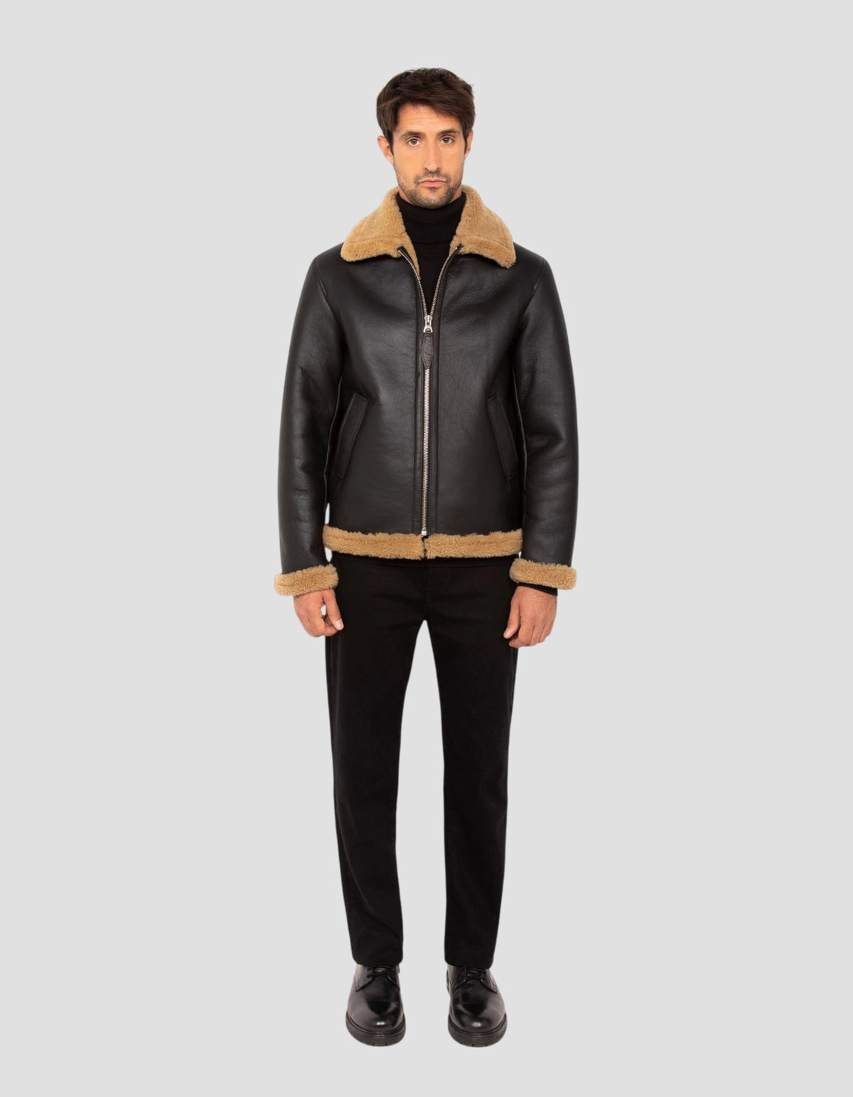 Blouson bombardier noir et gingembre, mouton double face