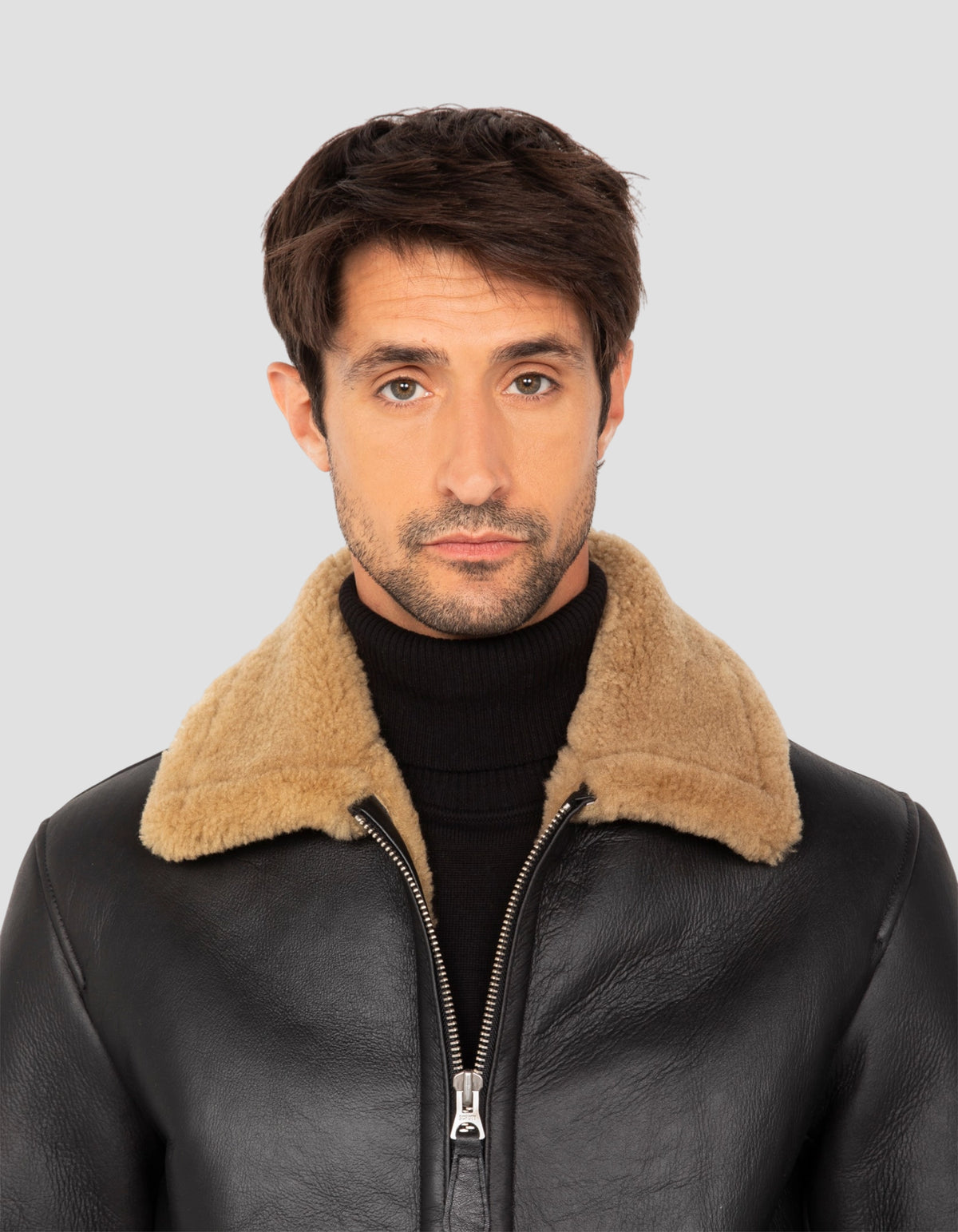 Blouson bombardier noir et gingembre, mouton double face