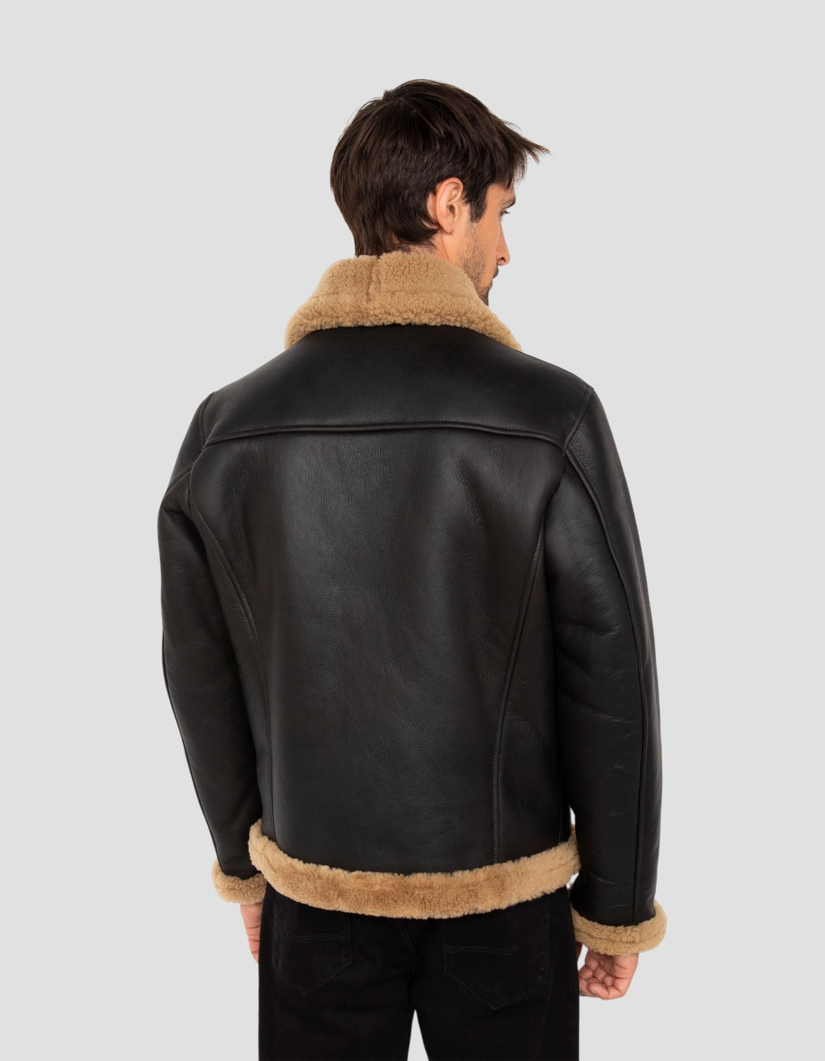 Blouson bombardier noir et gingembre, mouton double face