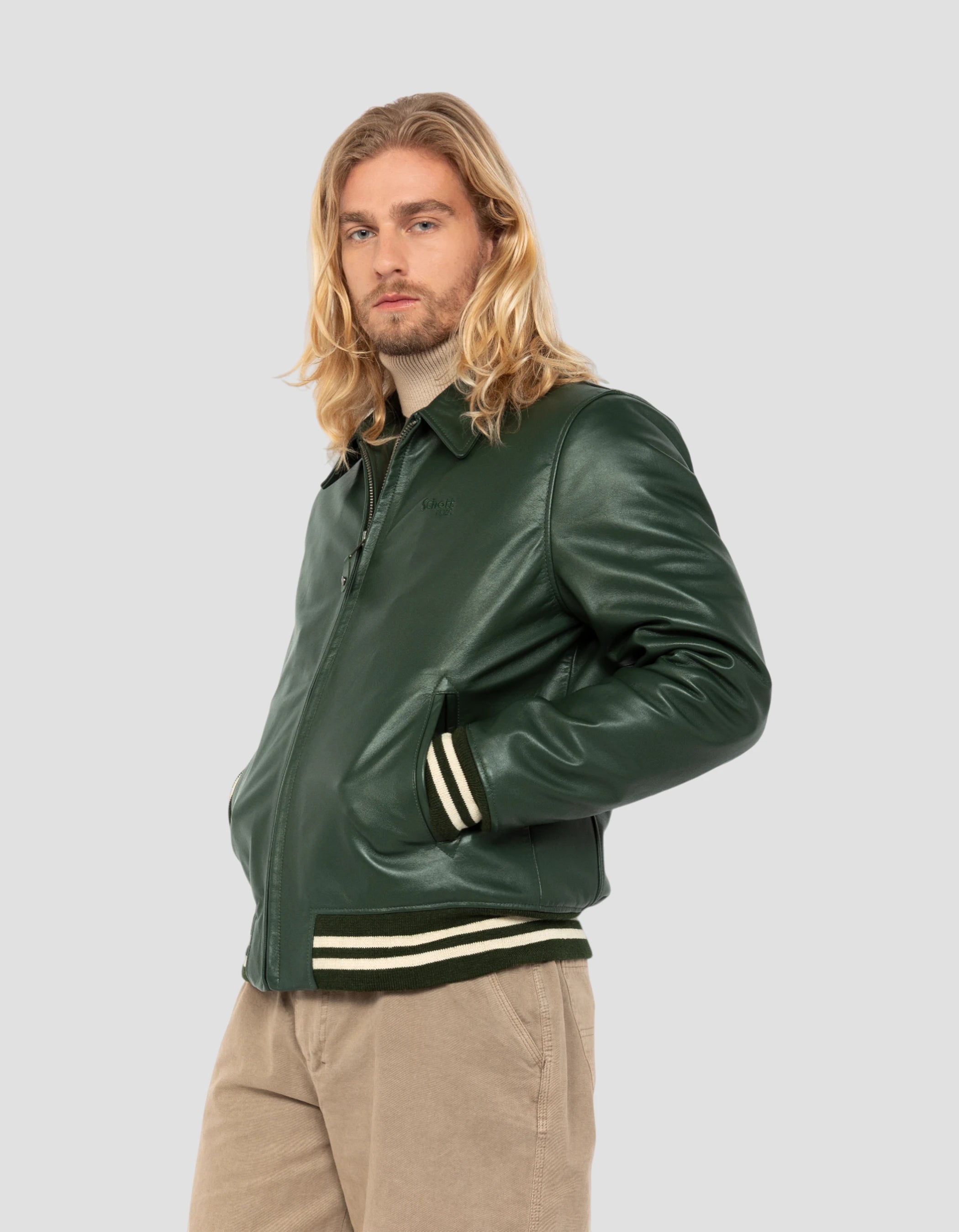 Casual green jacket with striped hill edge, cowhide leather Casual green jacket with striped hill edge, cowhide leather
