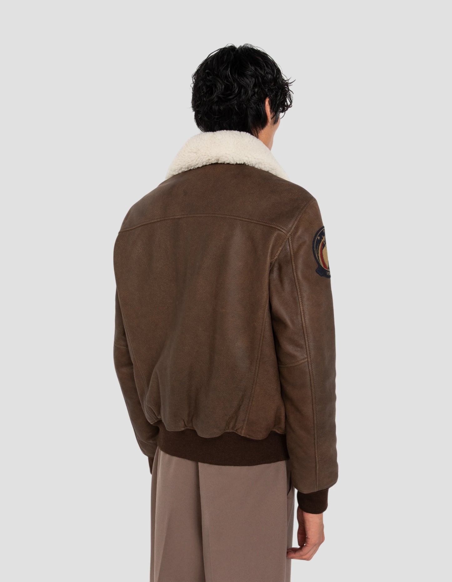 Blouson marron aviateur vintage badgé, cuir de chèvre