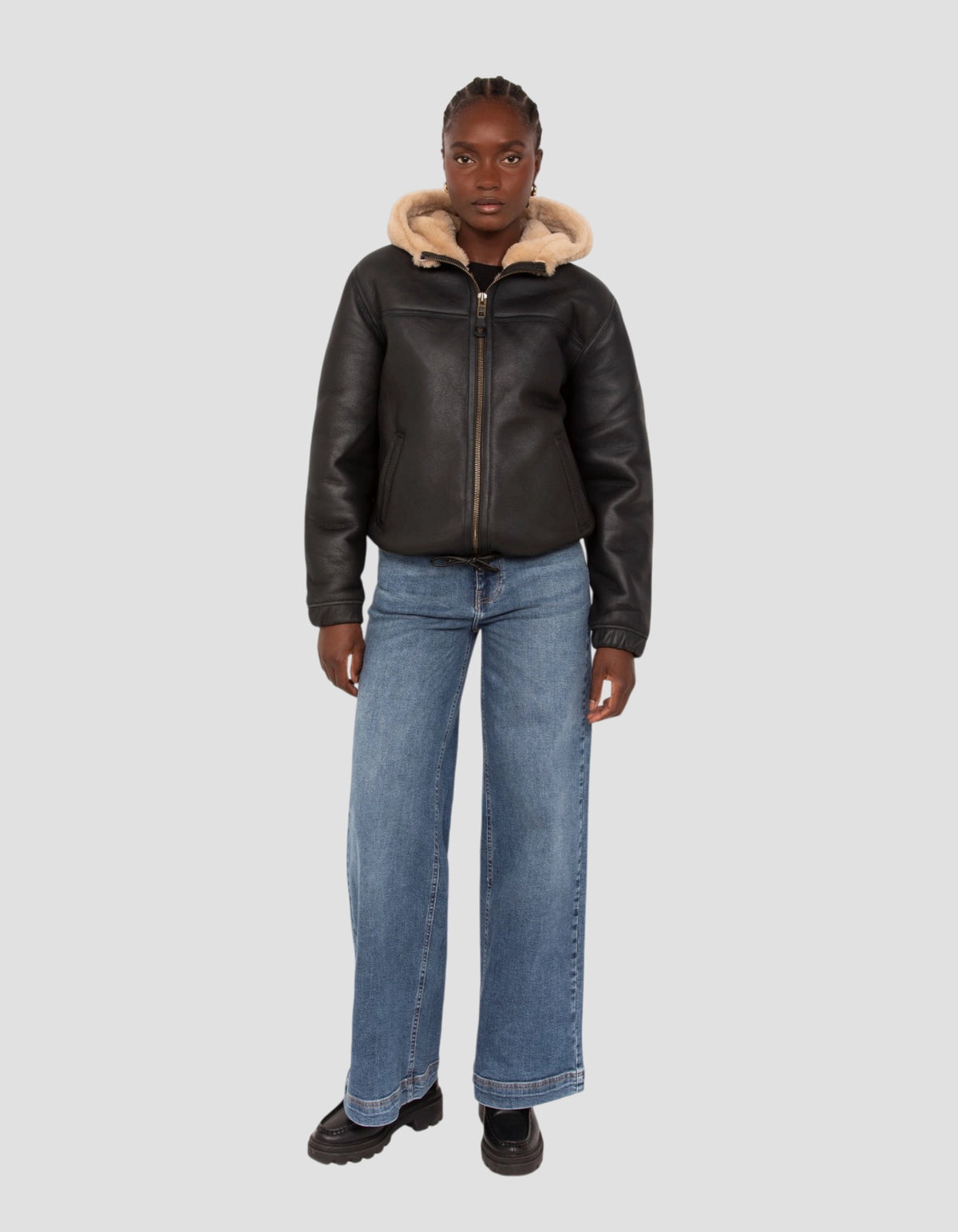 Giubbotto bomber nero e beige con cappuccio in montone double face-1