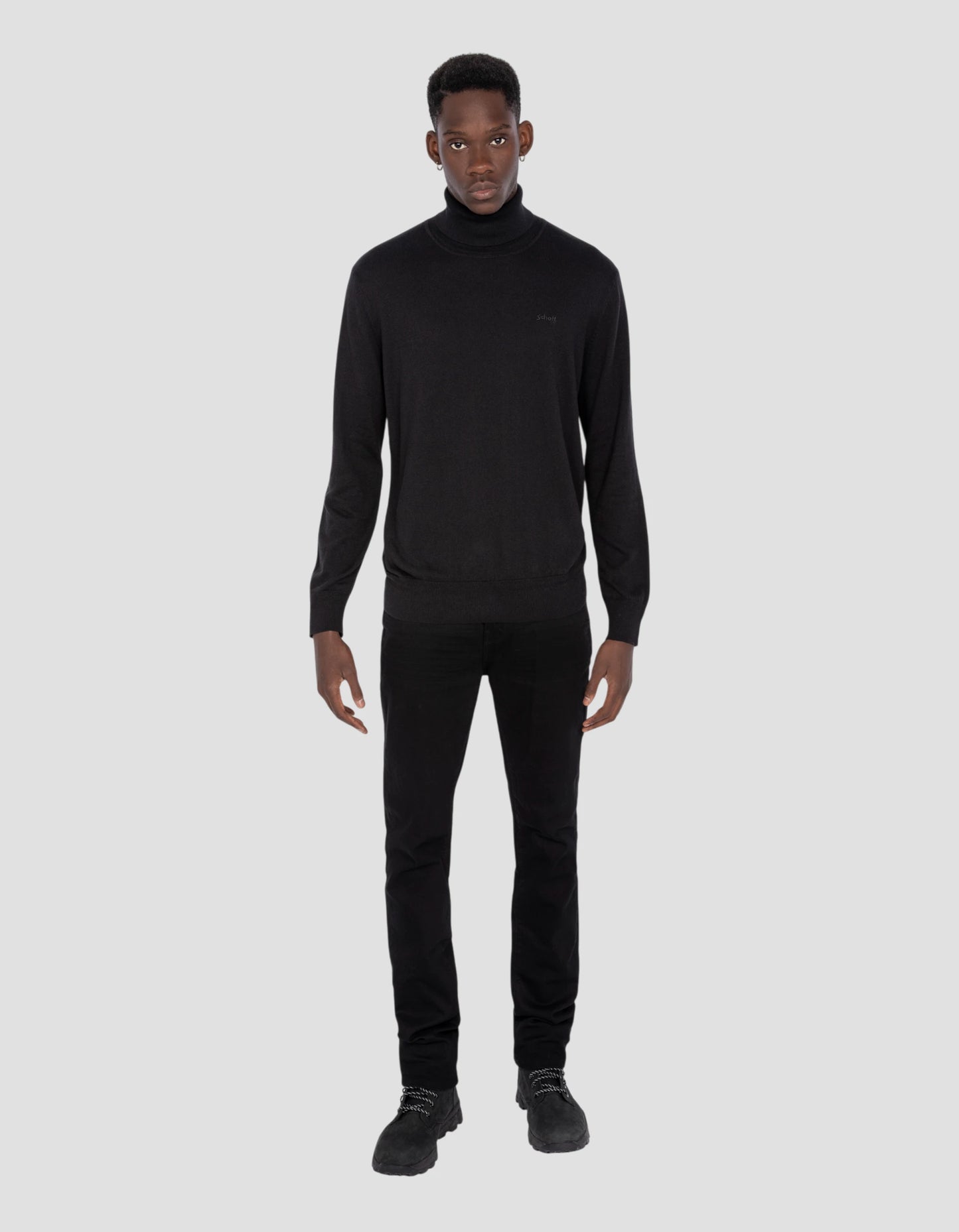 Maglione a dolcevita nera in mesh fine