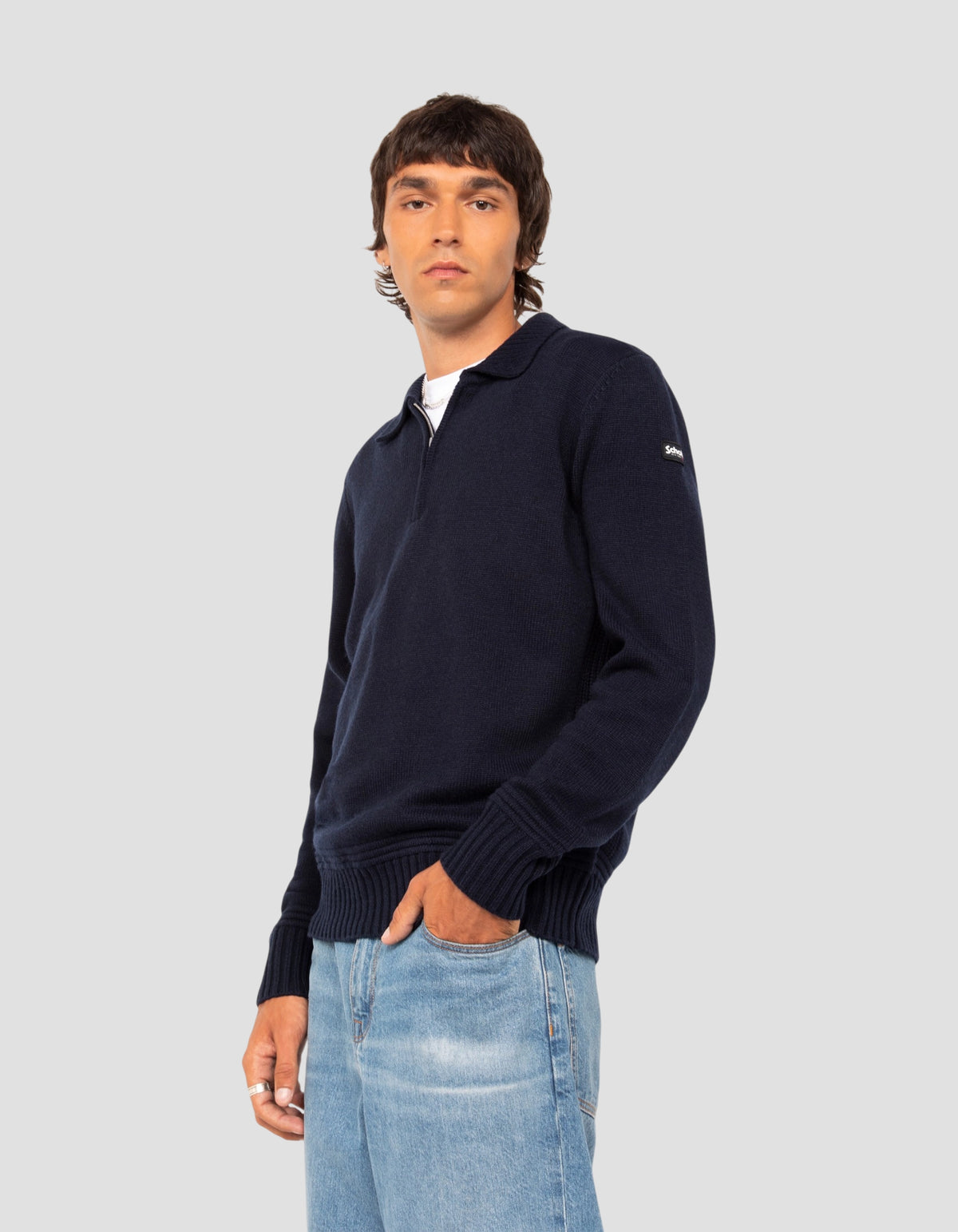 Maglione blu navy con colletto polo con zip e lavorazione a maglia fantasia
