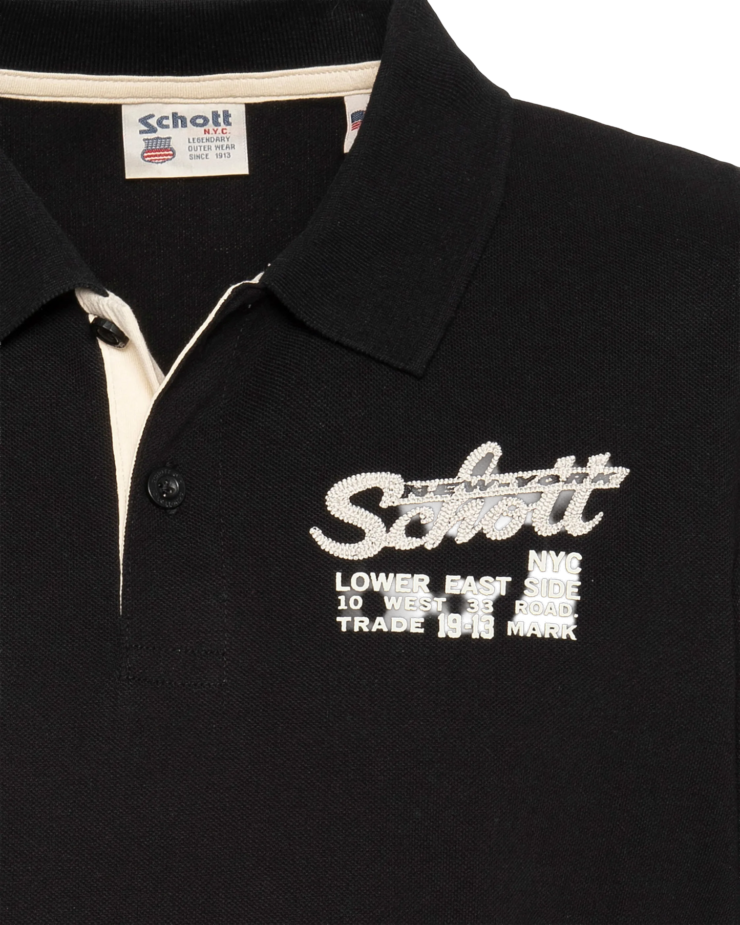 Polo noir avec logo brodé et patte contrastée