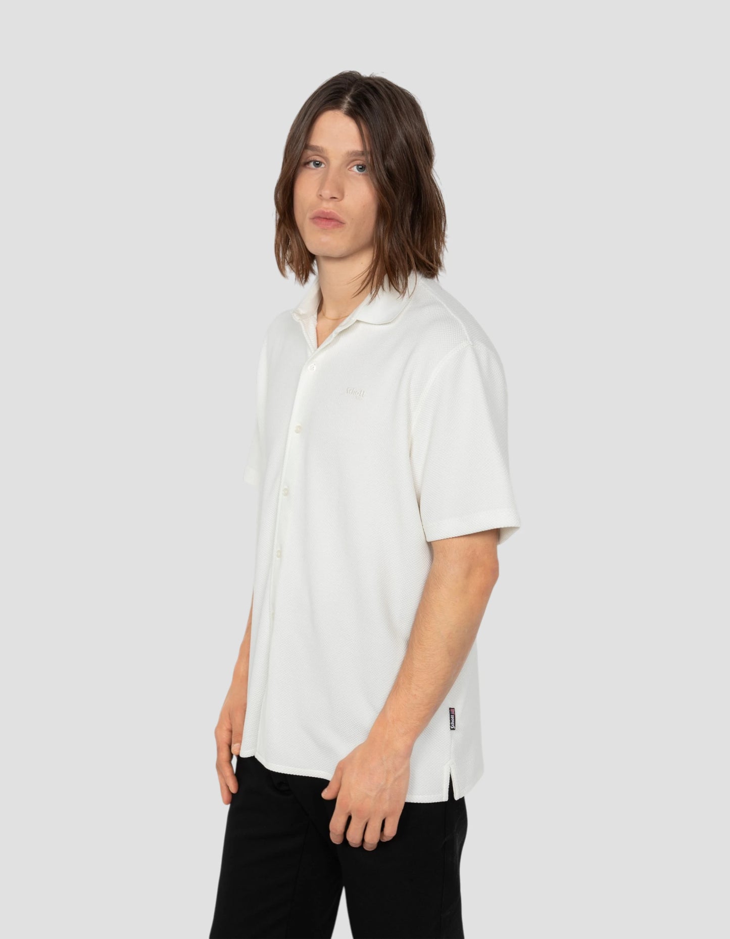 Waffle-effect knitted white shirt