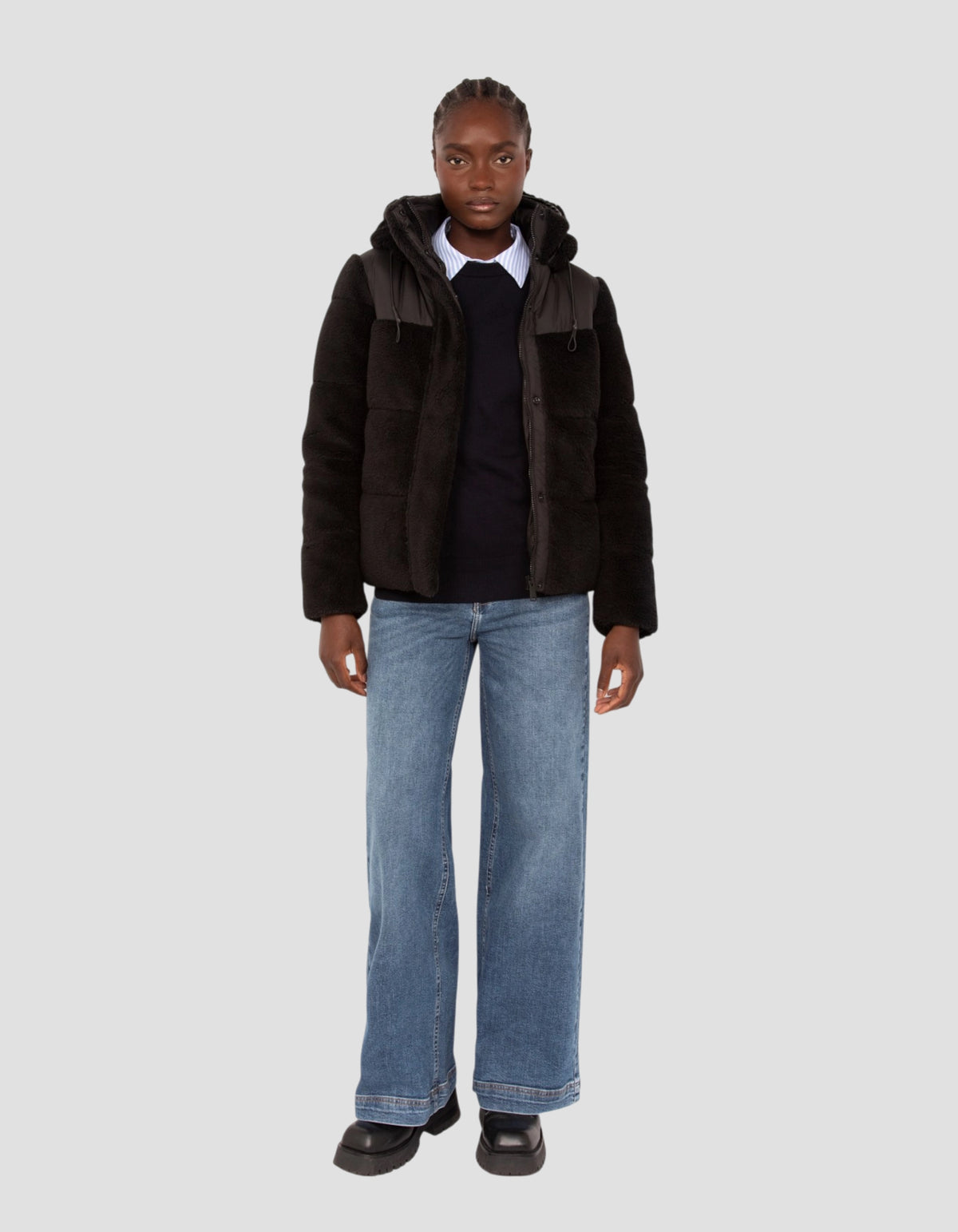 Piumino sherpa bimateriale nero con cappuccio