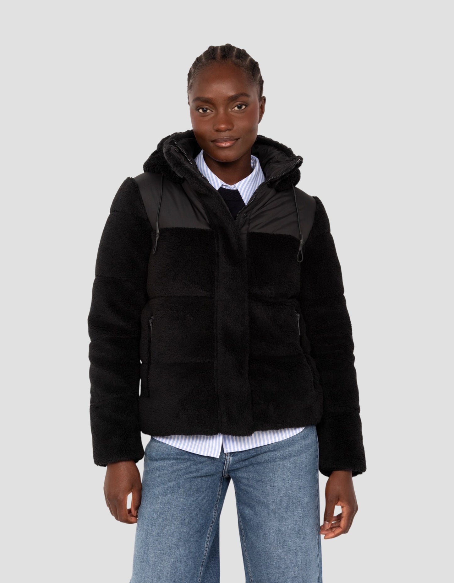 Piumino sherpa bimateriale nero con cappuccio