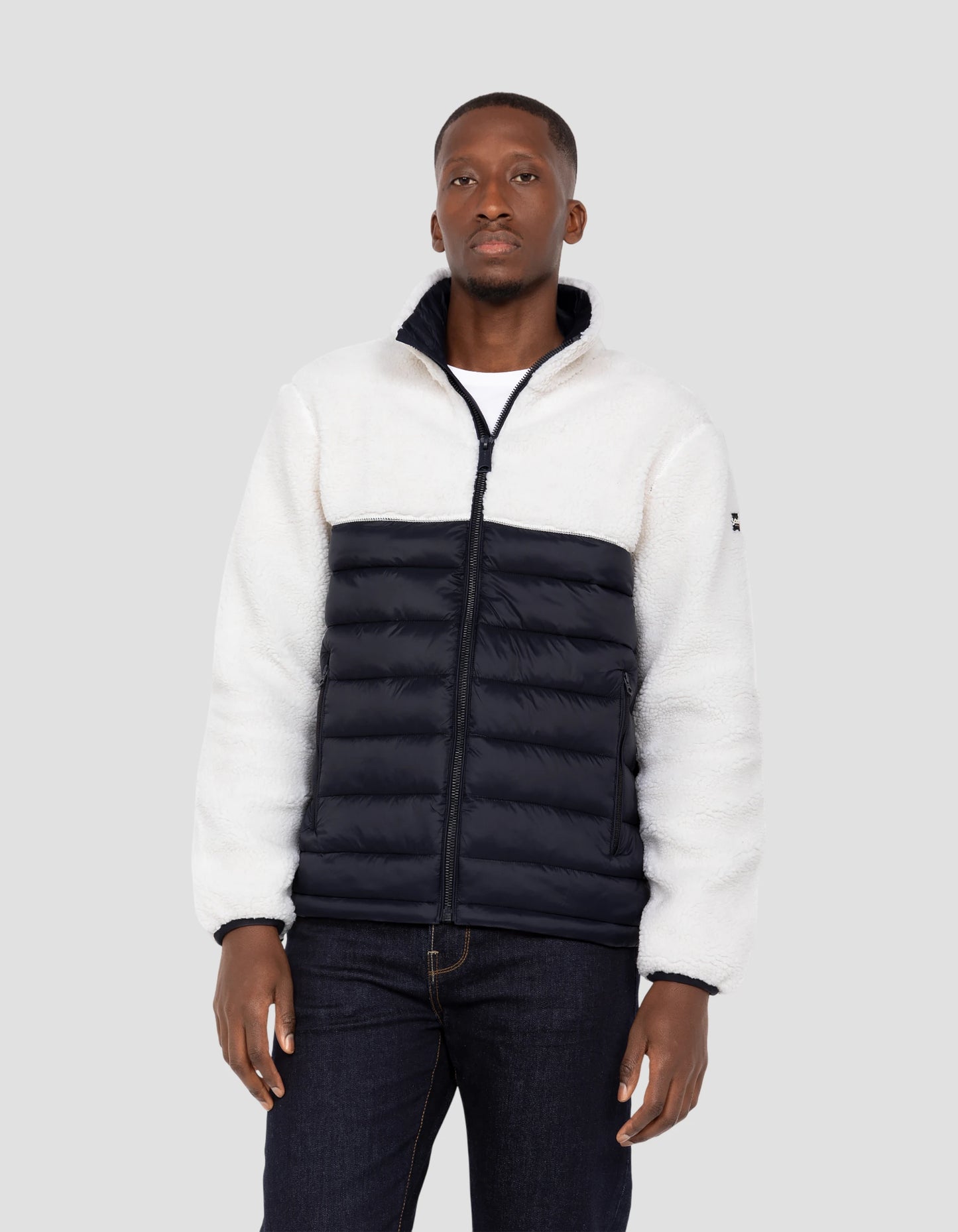 Veste blance cassé et bleu marine bi matière sherpa et nylon doudouné