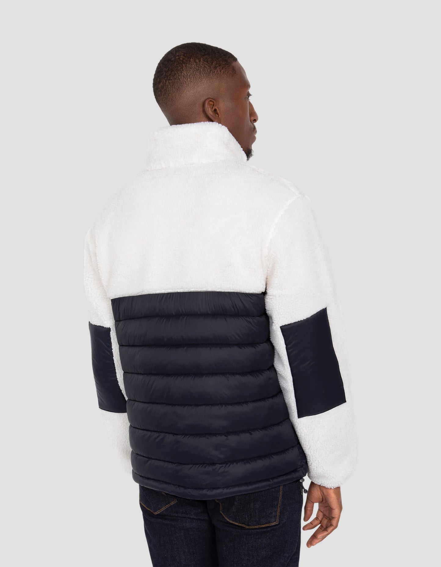 Veste blance cassé et bleu marine bi matière sherpa et nylon doudouné