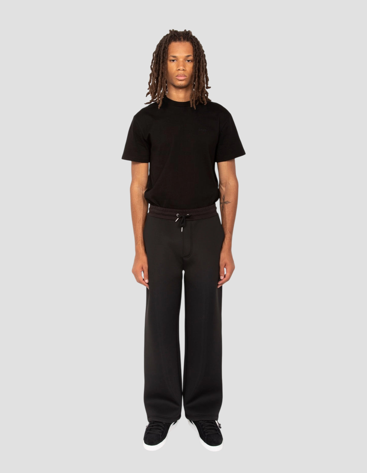 Black neoprene jogging pants